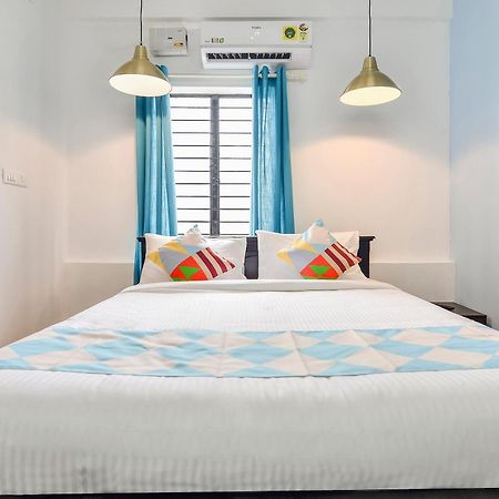 Hotel O Pop Tavern Thiruvananthapuram Bagian luar foto